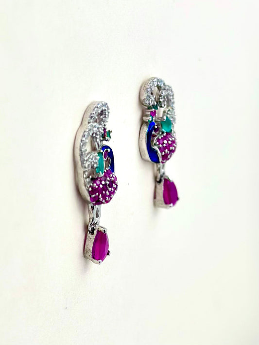 Pink stones, zircon studded, peacock shaped sterling silver danglers