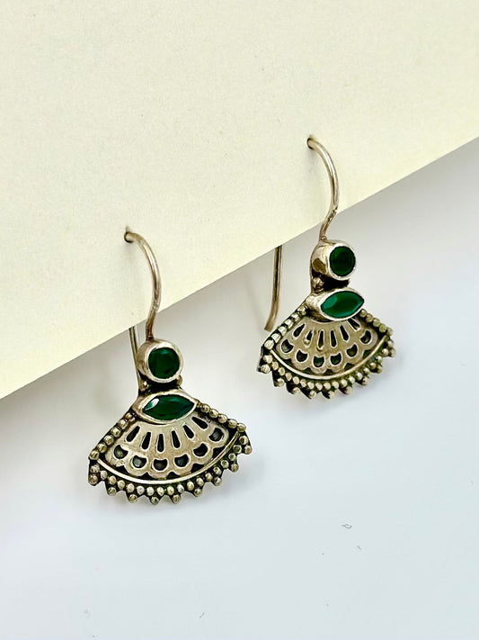 Shaped like a Peacock's veil, studded with emerald stones, oxidised, sterling silver drop earrings