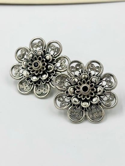 Oxidised, studded with fancy stone, sunflower shaped steroling silver studs with detailing