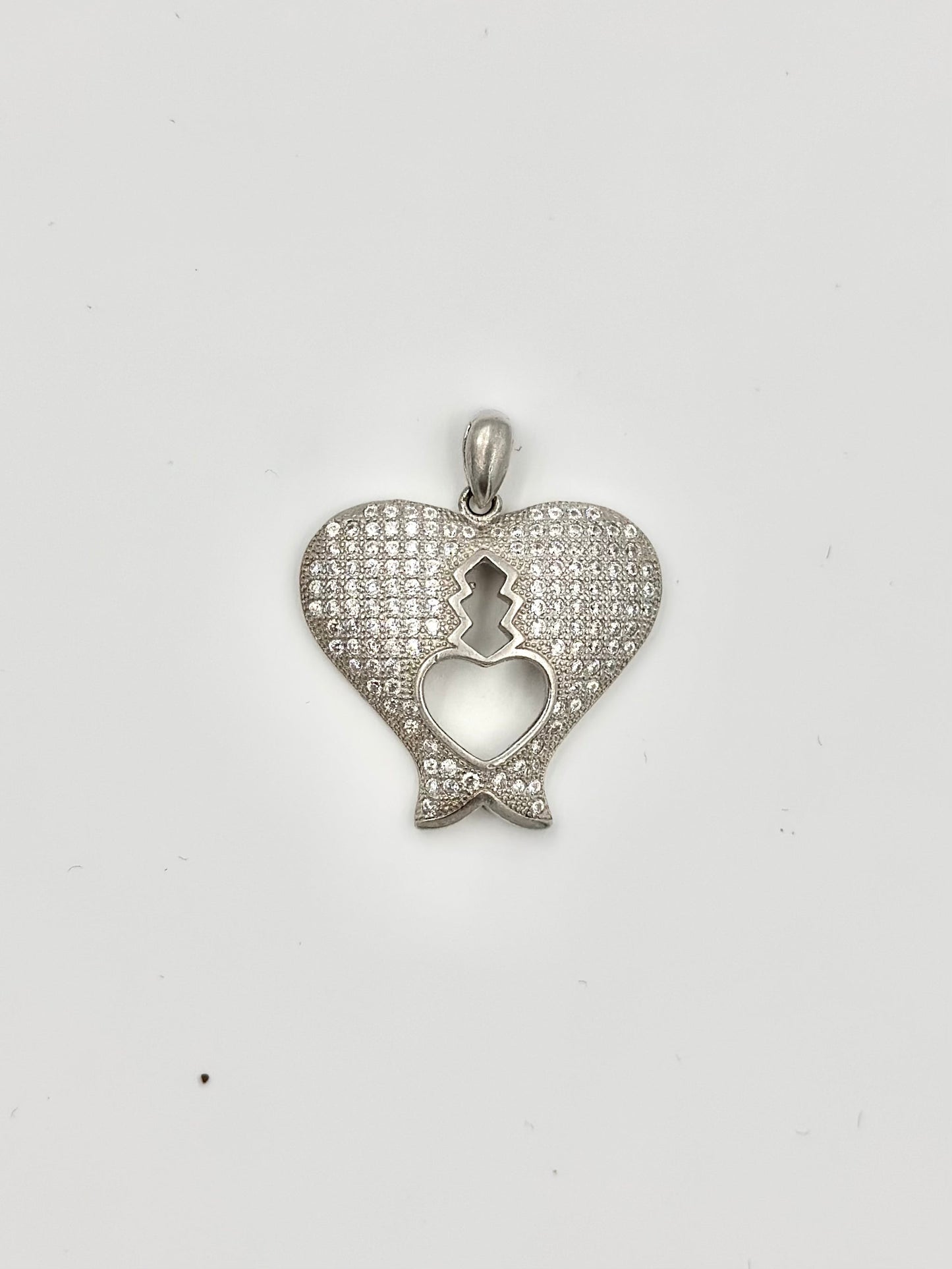 Heart shaped, zircon studded sterling silver pendants