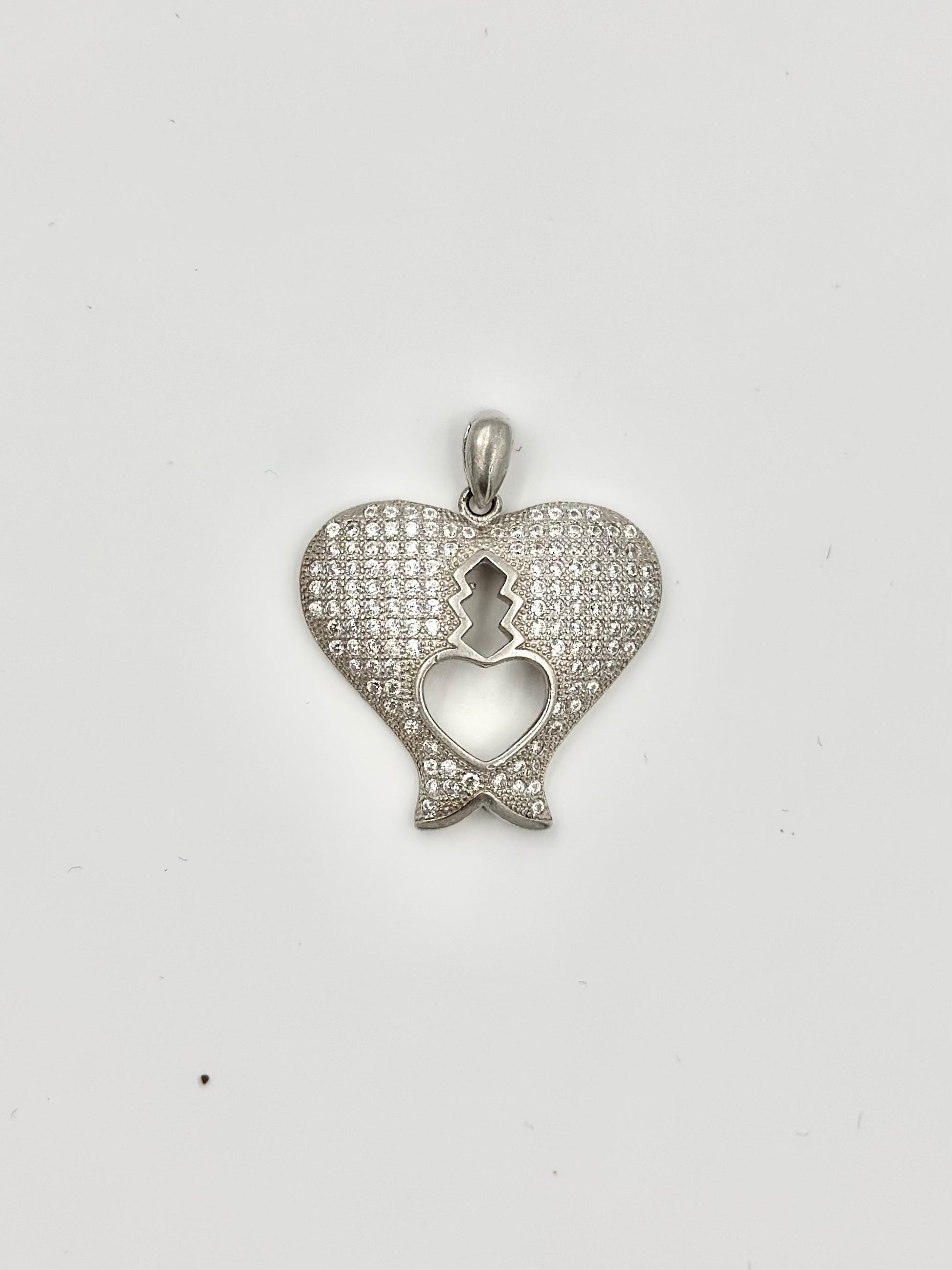 Heart shaped, zircon studded sterling silver pendants