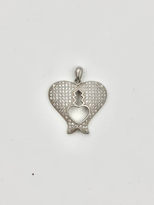 Heart shaped, zircon studded sterling silver pendants