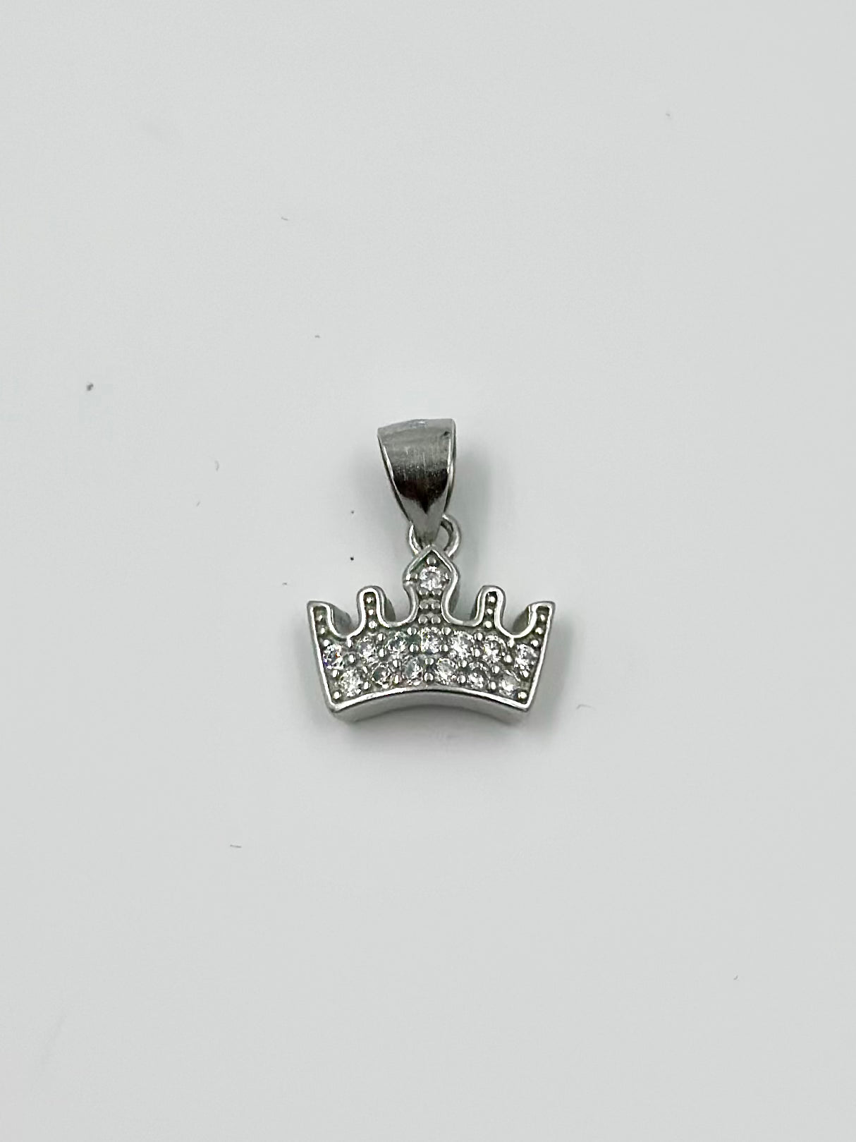 Crown shaped, zircon studded sterling silver pendant