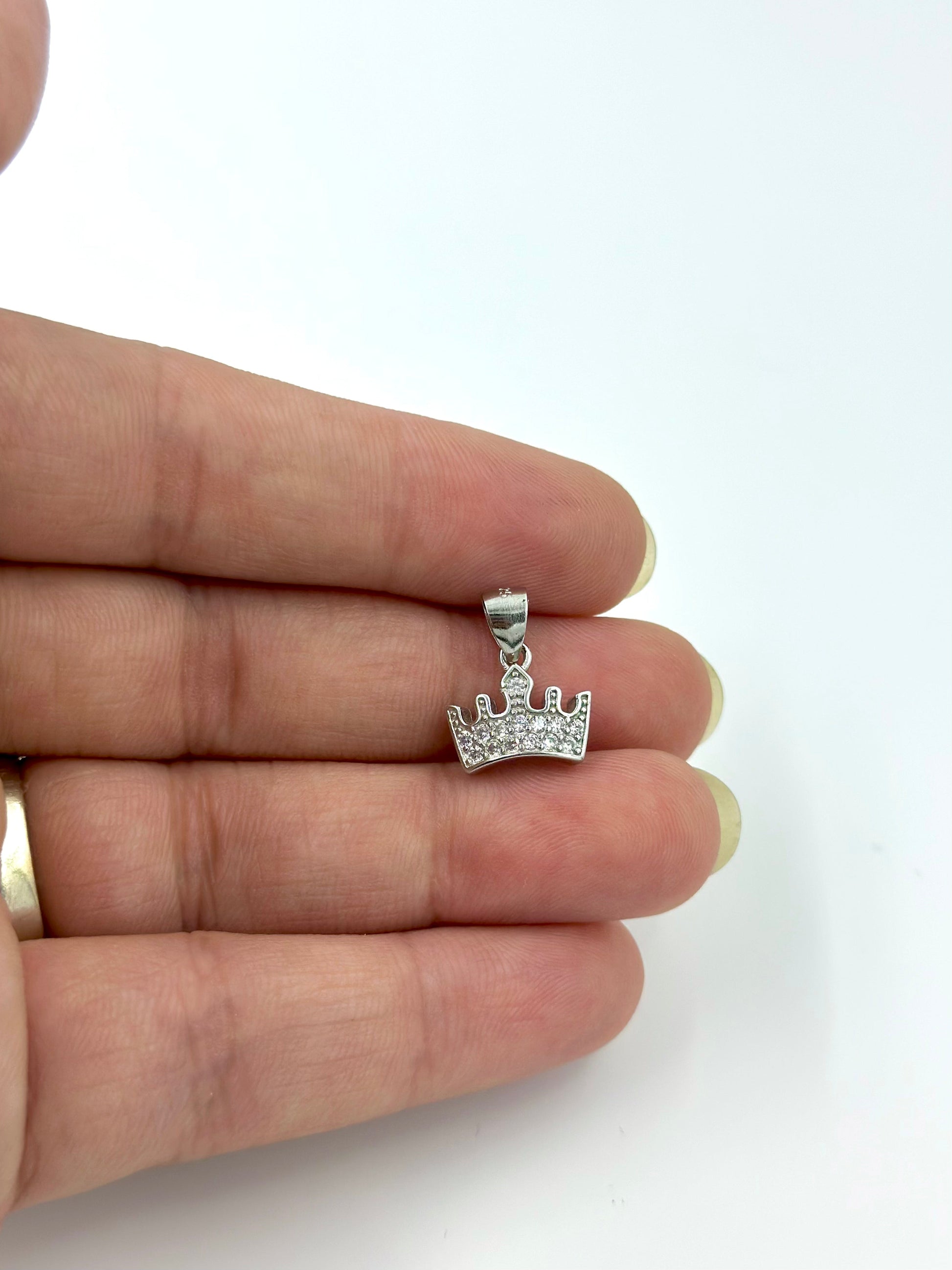 Crown shaped, zircon studded sterling silver pendant