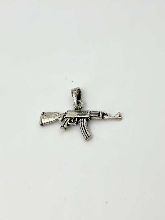 Gun shaped, oxidised sterling silver pendants