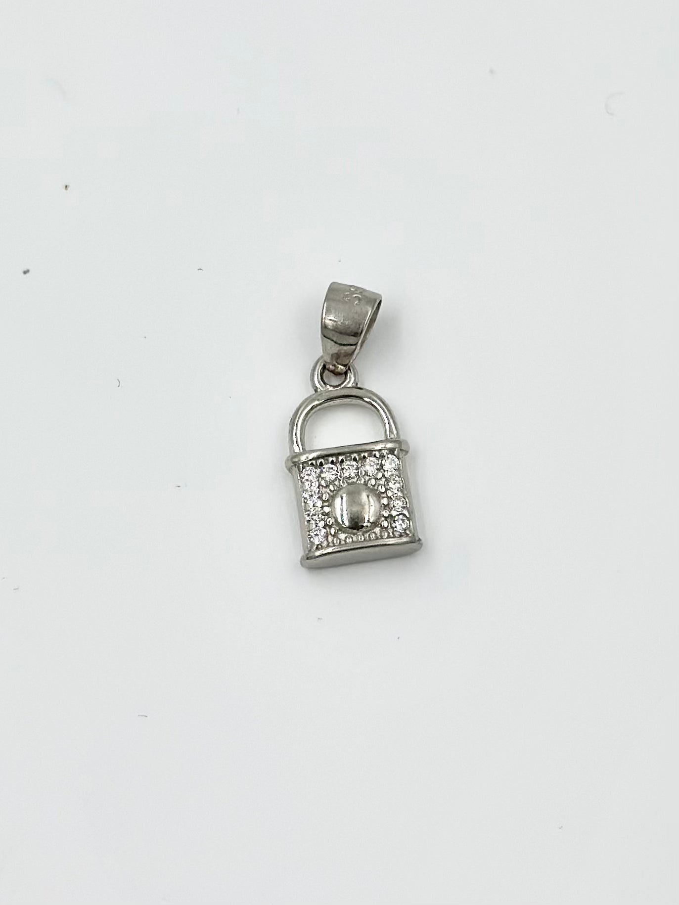 Zircon studded, lock shaped sterling silver pendant