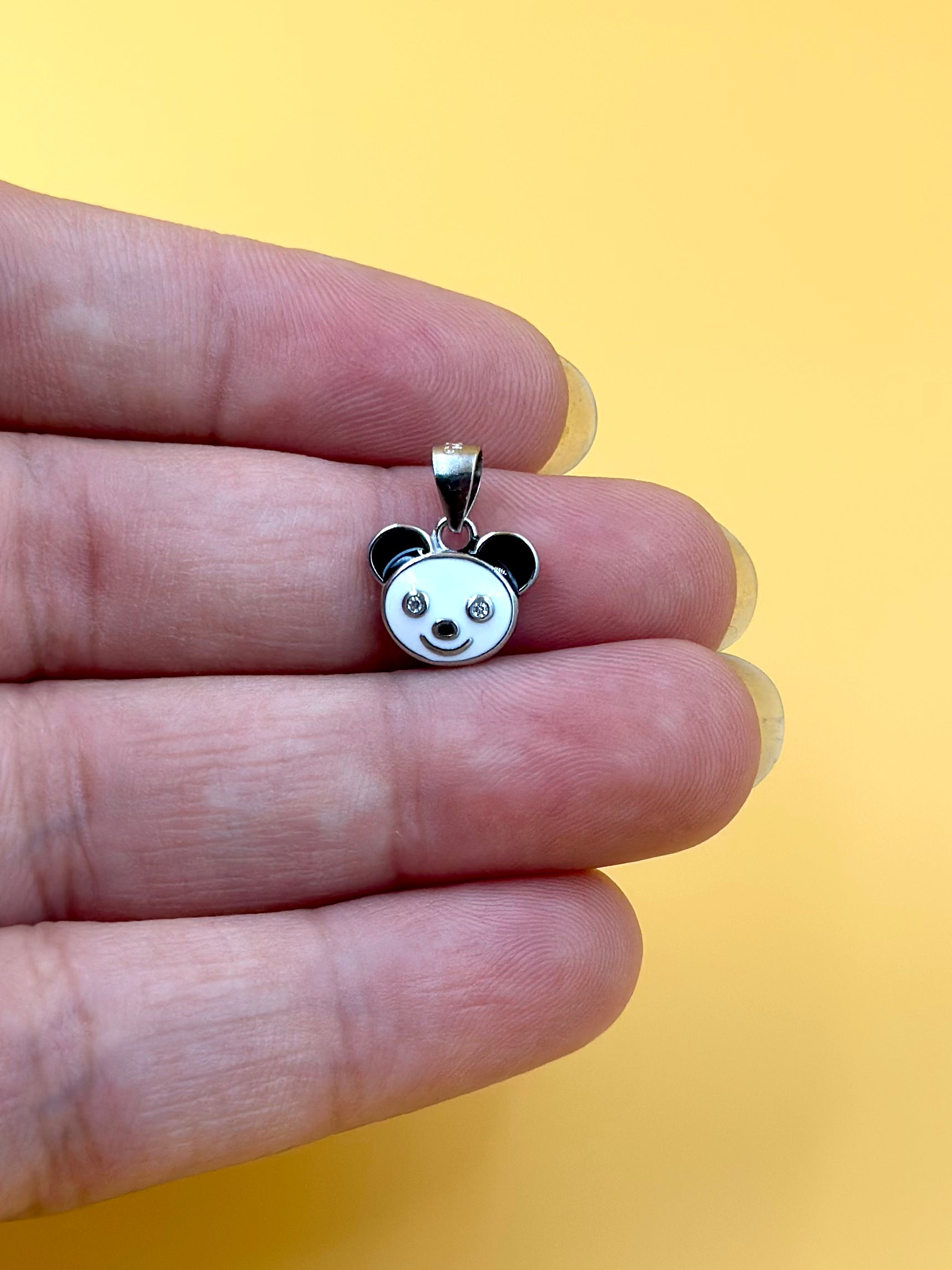 Zircon studded, enamel coated, panda shaped sterling silver pendant