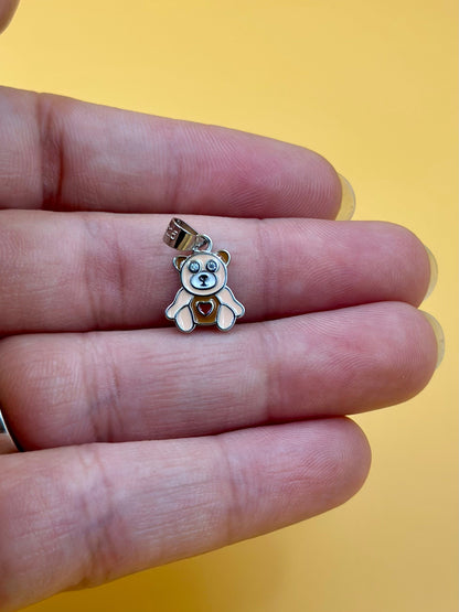 Zircon studded, enamel coated, teddy bear shaped sterling silver pendant