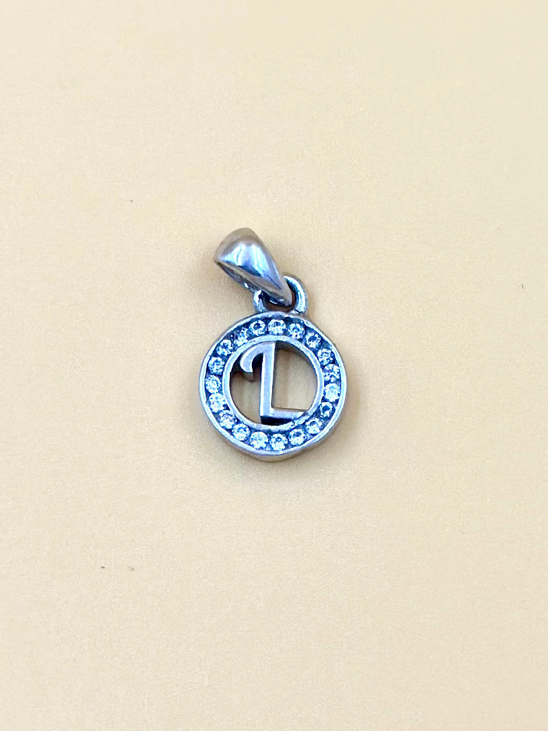 L shaped, zircon studded sterling silver pendant