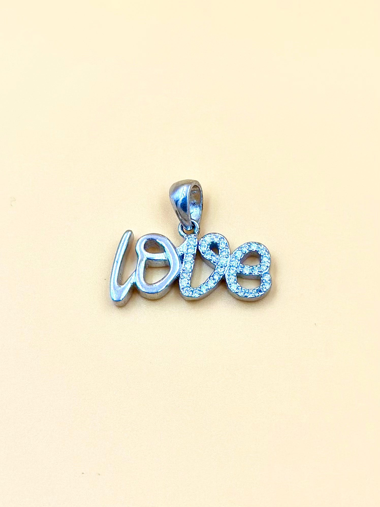 Zircon studded sterling silver pendant