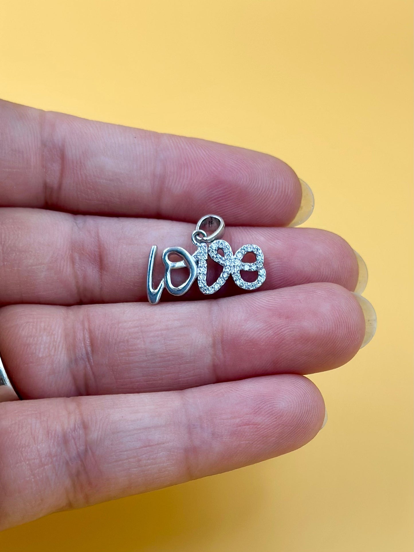 Zircon studded sterling silver pendant