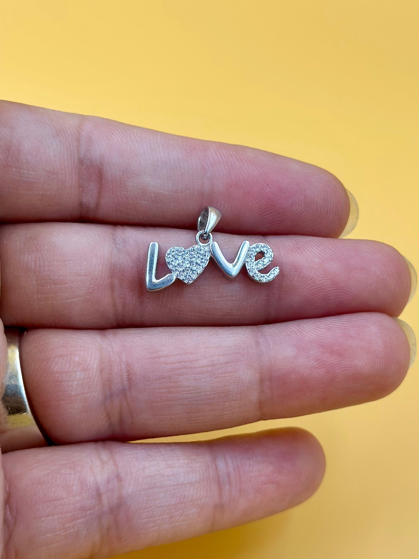 Zircon studded sterling silver pendant