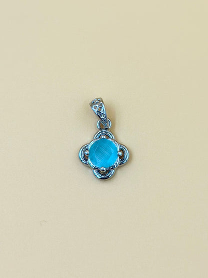 Fancy stone studded sterling silver pendant