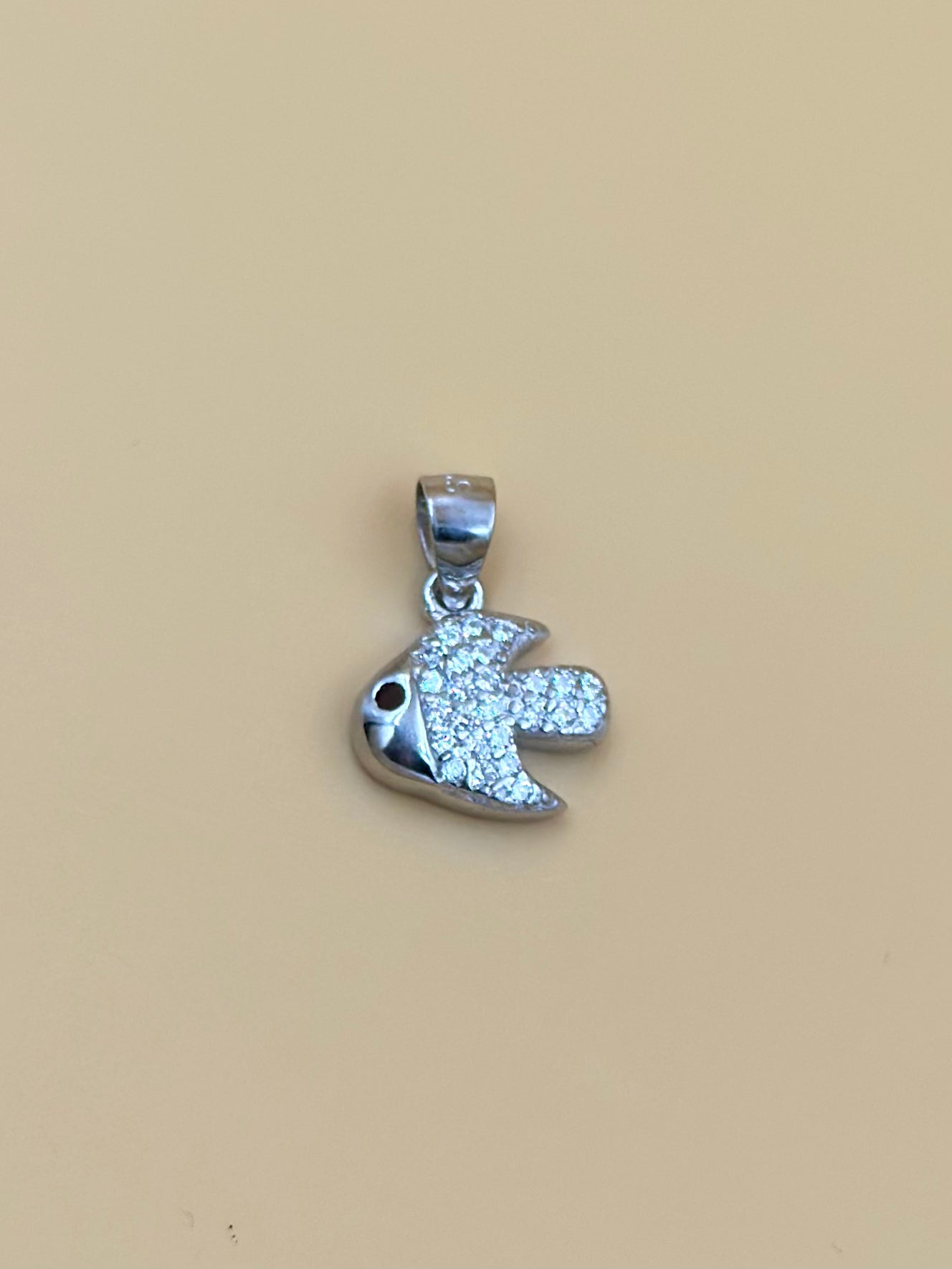 Zircon studded, fish shaped sterling silver pendant