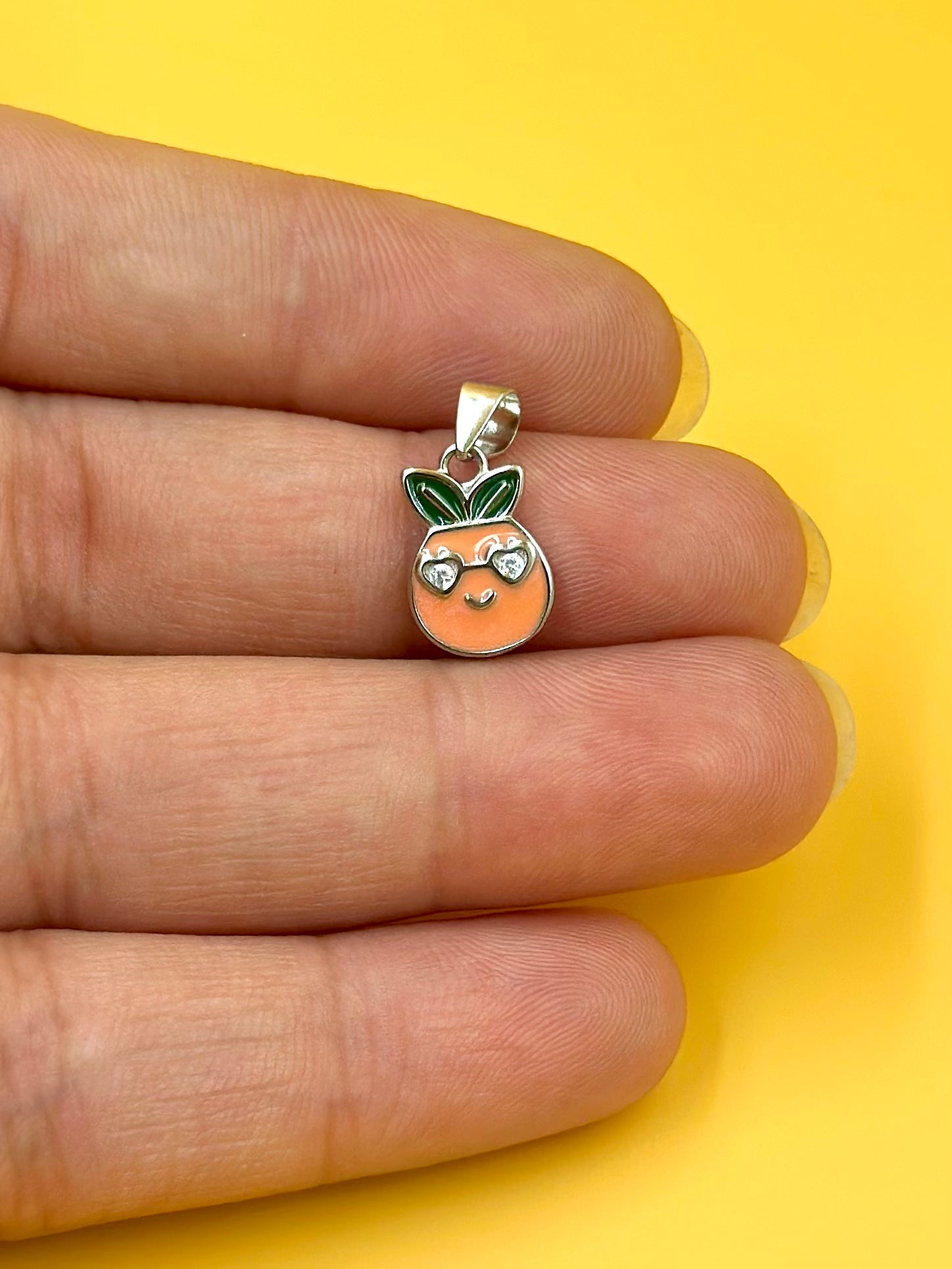 Zircon studded, enamel coated, bunny shaped sterling silver pendant