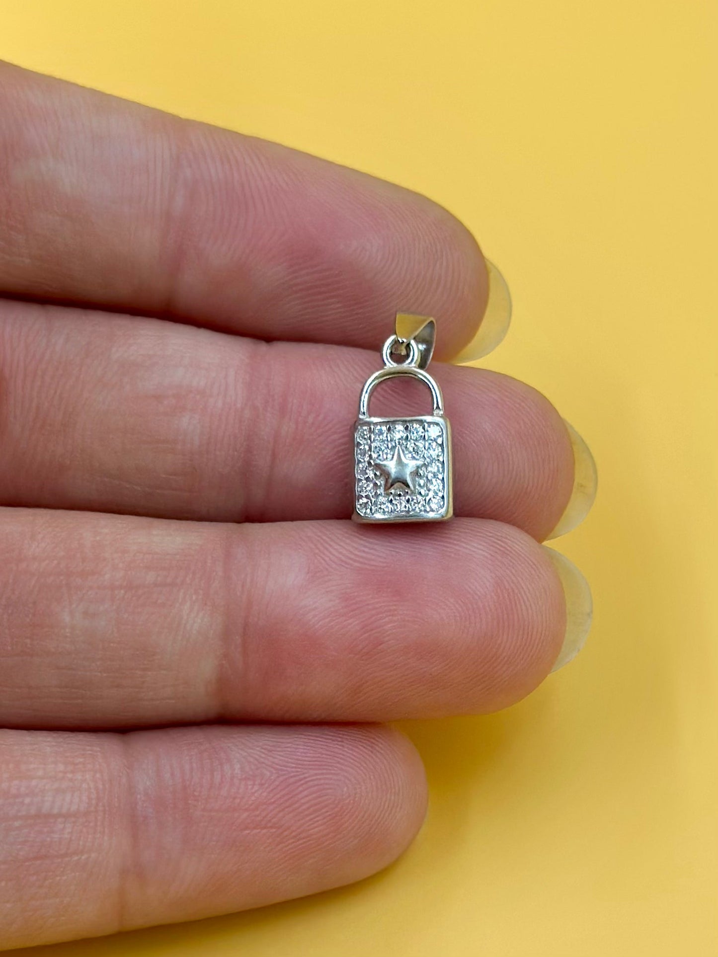 Zircon studded, lock shaped sterling silver pendant