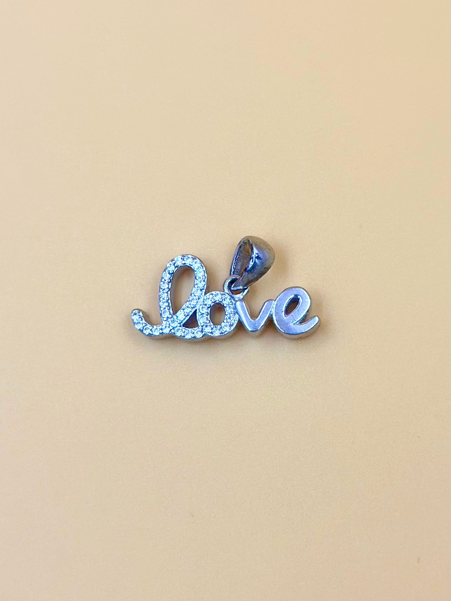 Zircon studded sterling silver pendant