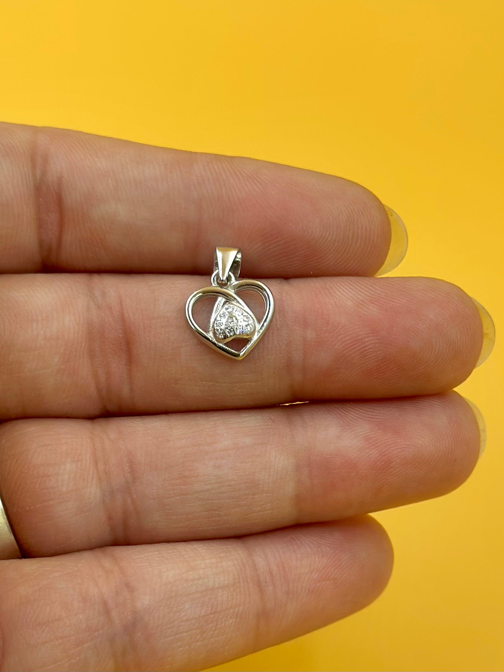 Zircon studded, heart shaped sterling silver pendant