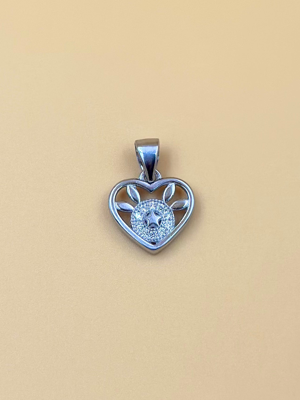 Zircon studded, heart shaped sterling silver pendant