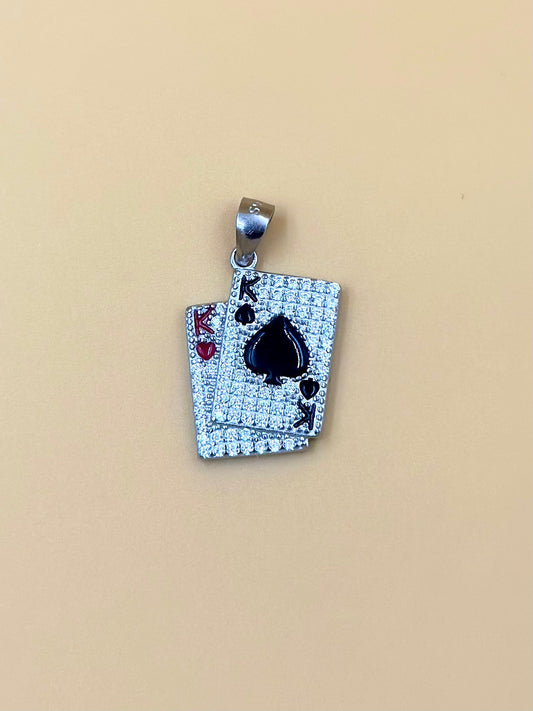 Zircon studded, enamel coated, card shaped sterling silver pendant