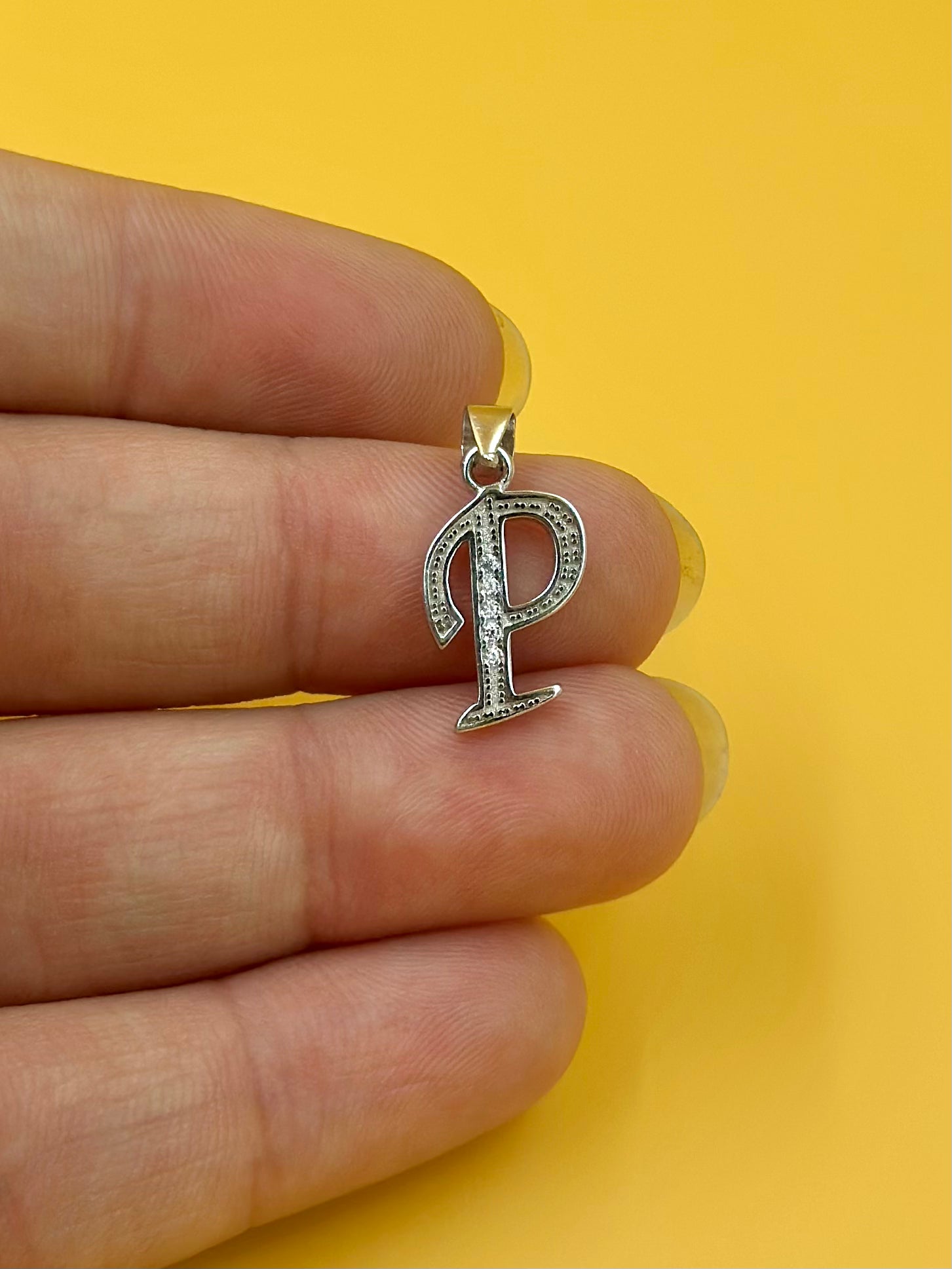  P shaped, zircon studded sterling silver pendant