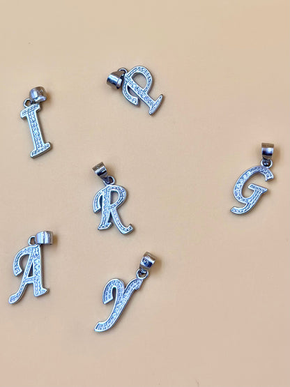  A shaped, zircon studded sterling silver pendant