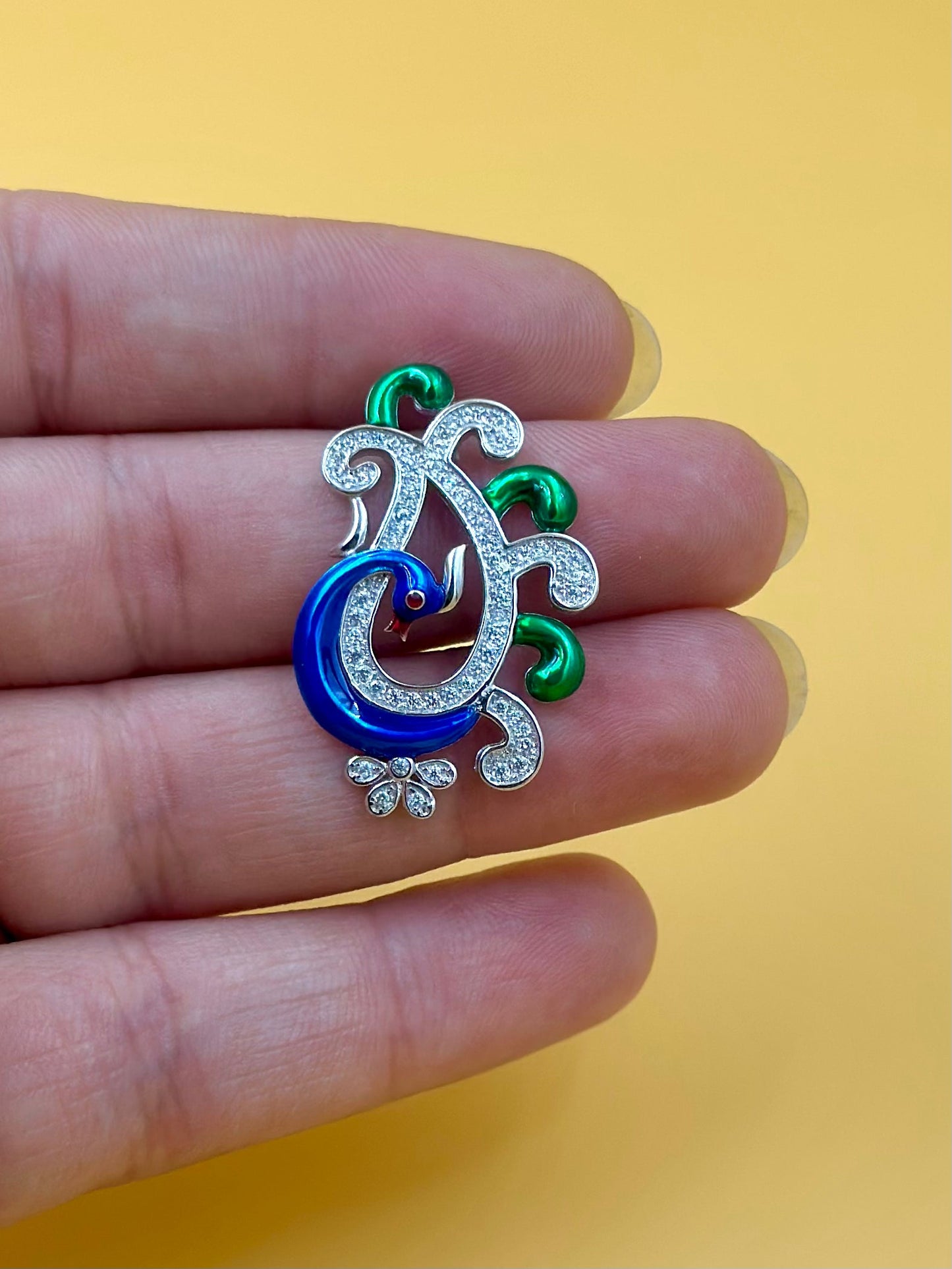 Zircon studded, enamel coated, peacock shaped sterling silver pendant