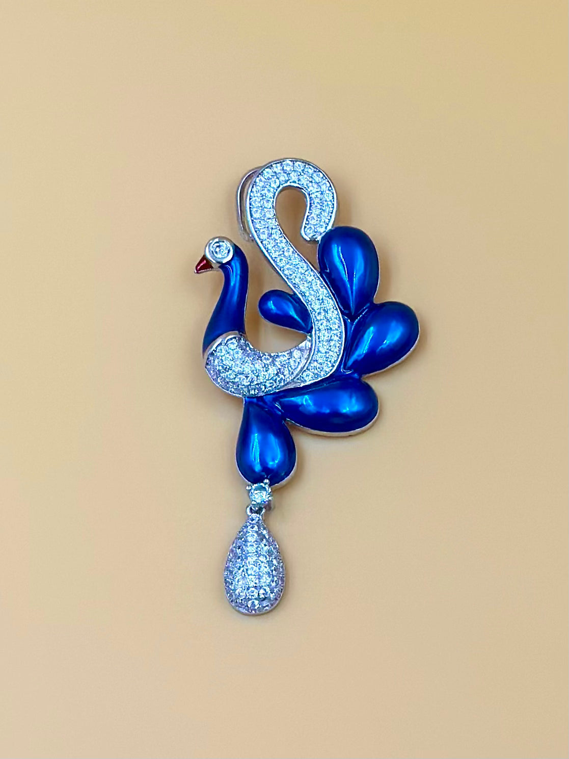 Zircon studded, enamel coated, peacock shaped sterling silver pendant