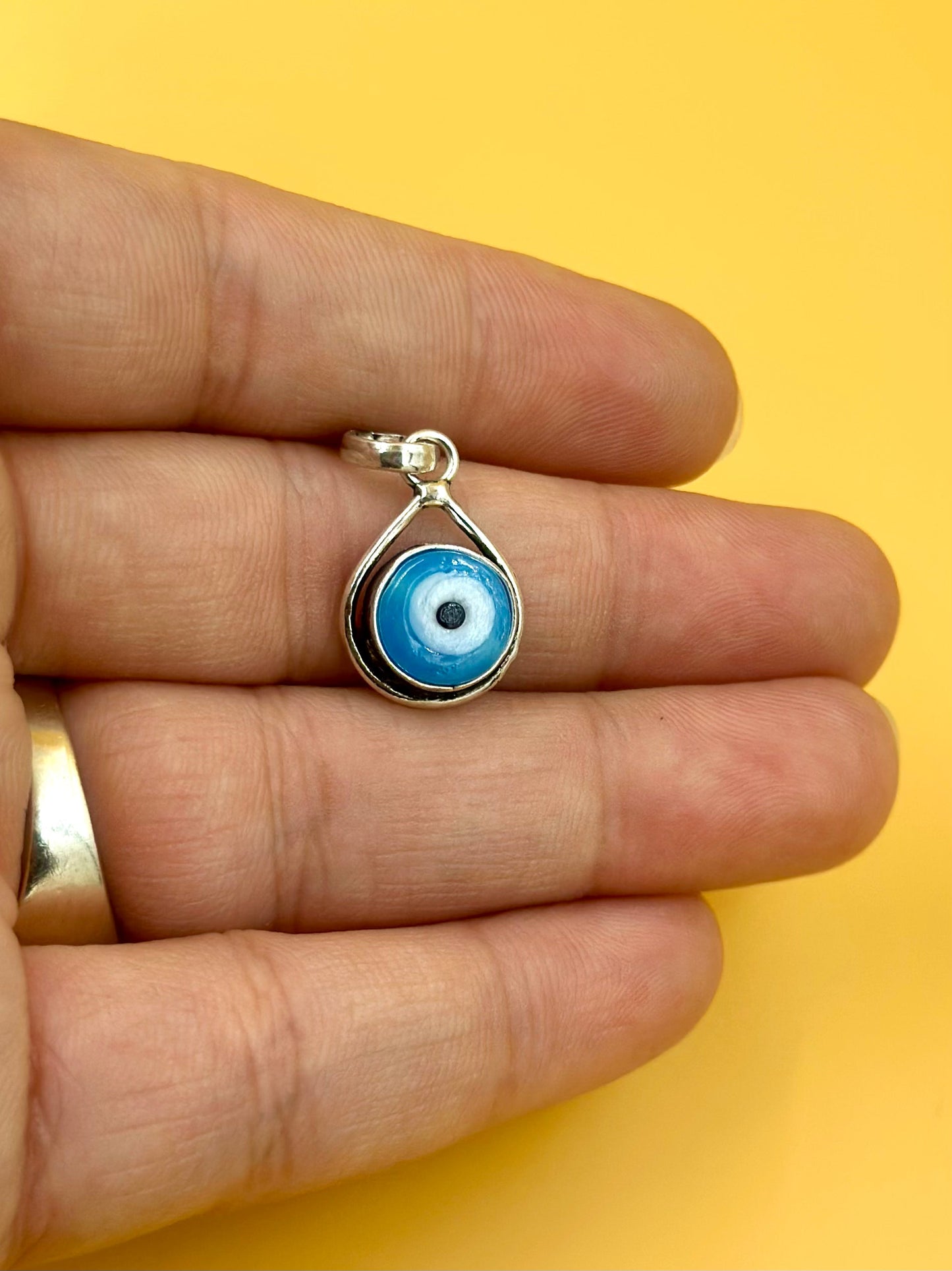 Enamel coated, evil eye sterling silver pendant