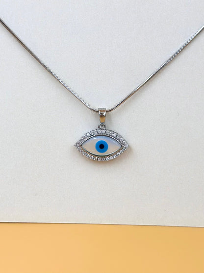 Zircon studded, enamel coated, evil eye sterling silver pendant