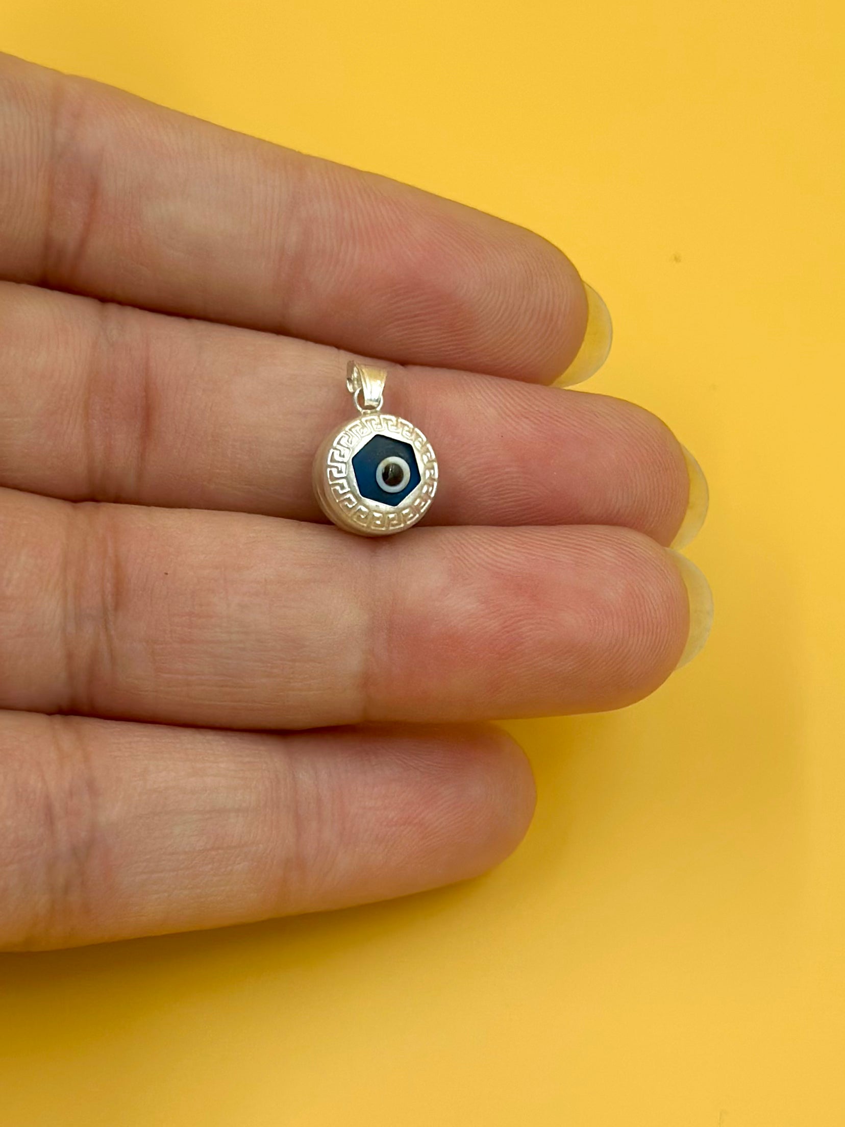 Enamel coated, evil eye sterling silver pendant