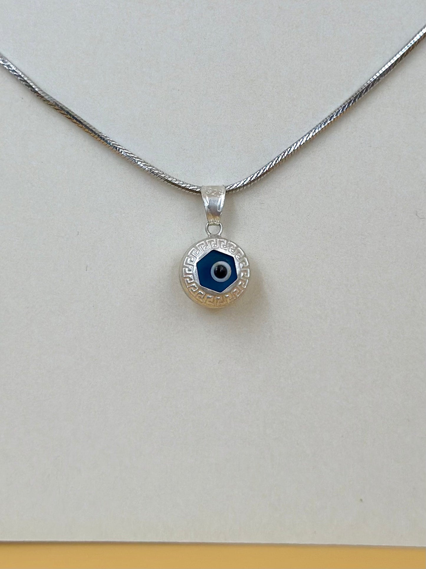 Enamel coated, evil eye sterling silver pendant