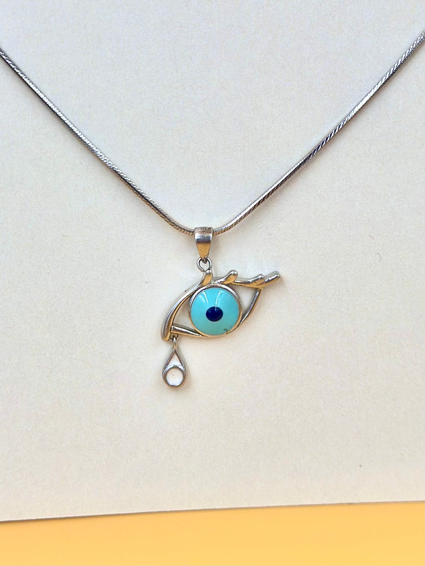 Enamel coated, evil eye sterling silver pendant