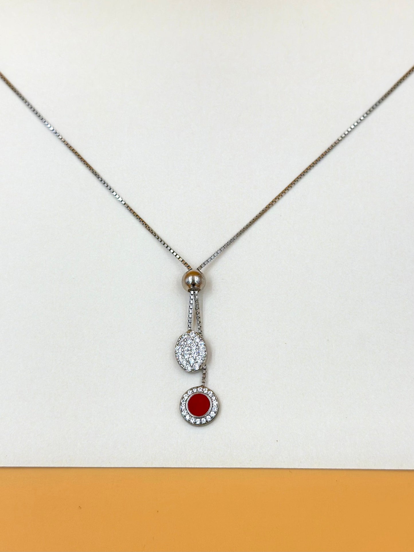 Ruby and zircon studded sterling silver pendant chain