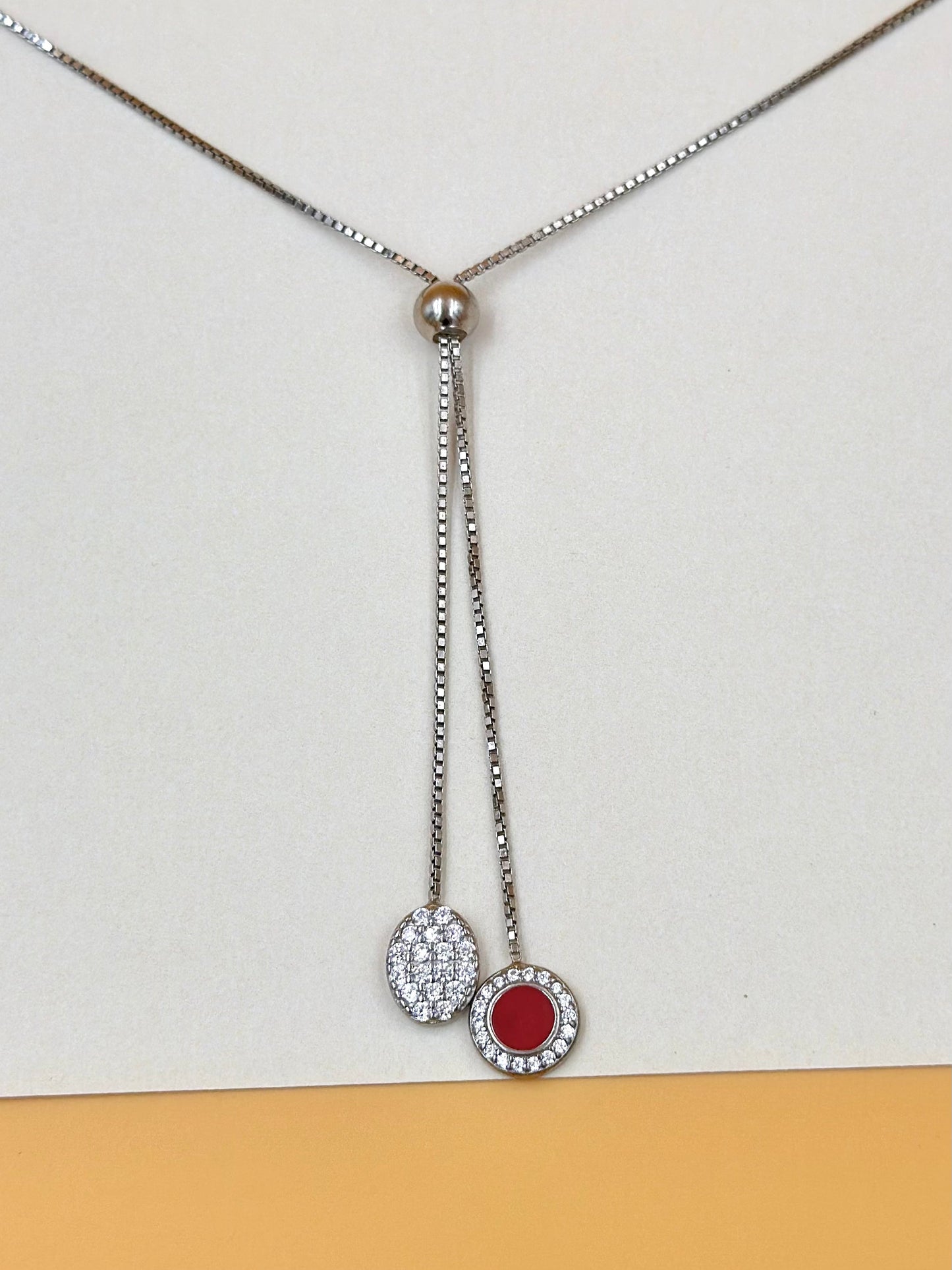 Ruby and zircon studded sterling silver pendant chain
