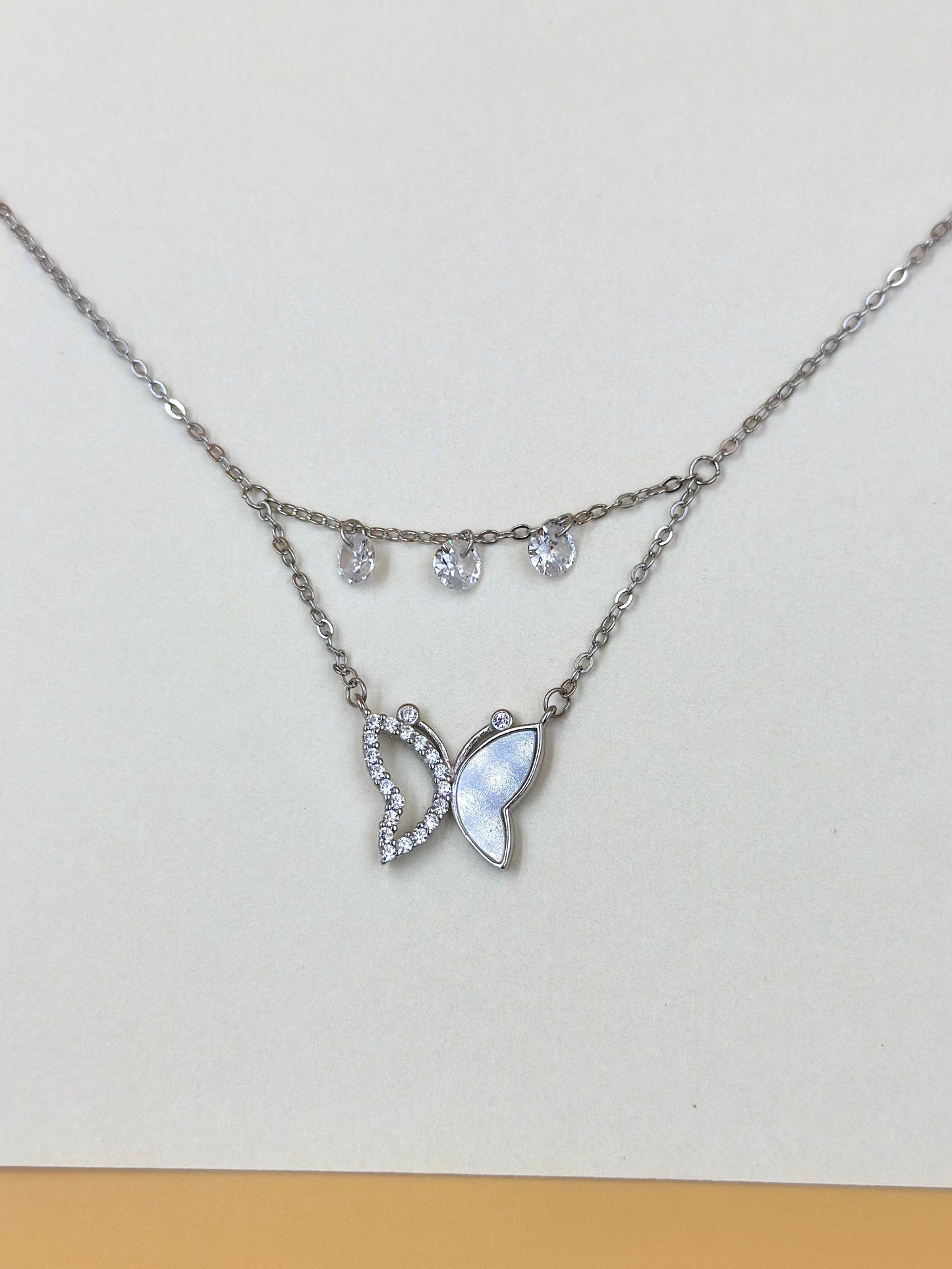 Zircon studded, butterfly shaped sterling silver pendant chain