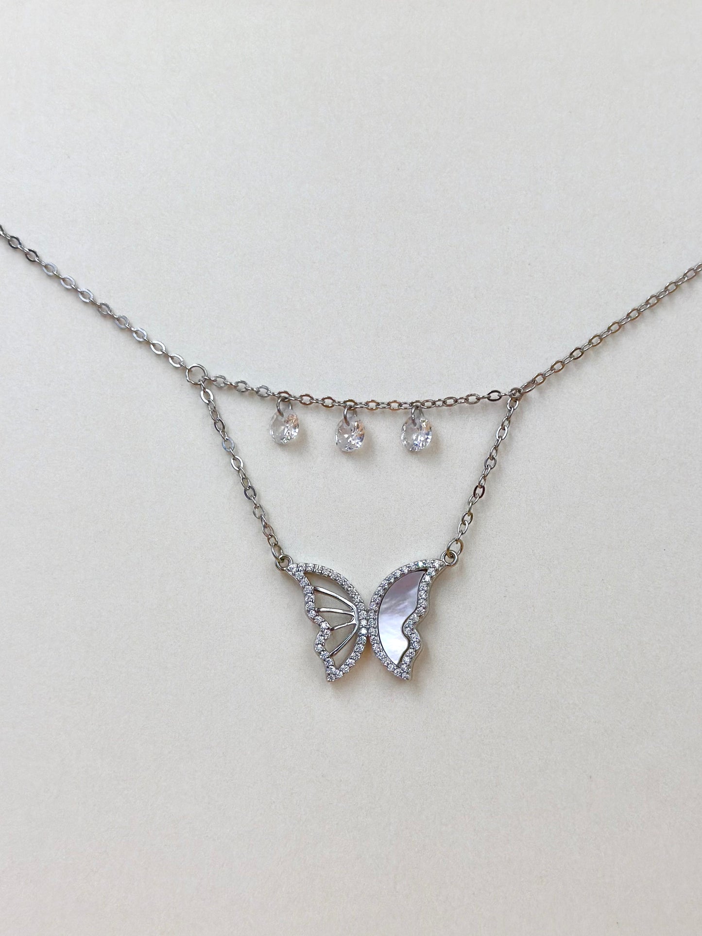 Zircon studded, butterfly shaped sterling silver pendant chain