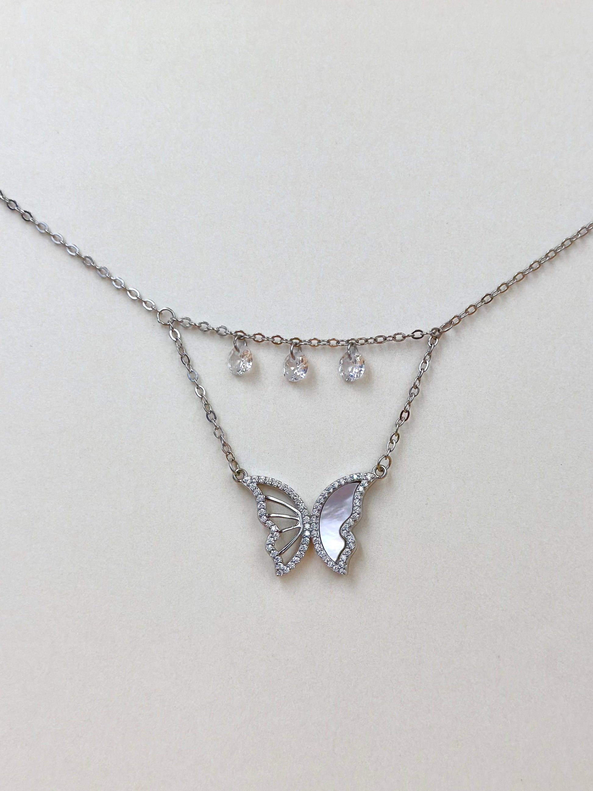 Zircon studded, butterfly shaped sterling silver pendant chain