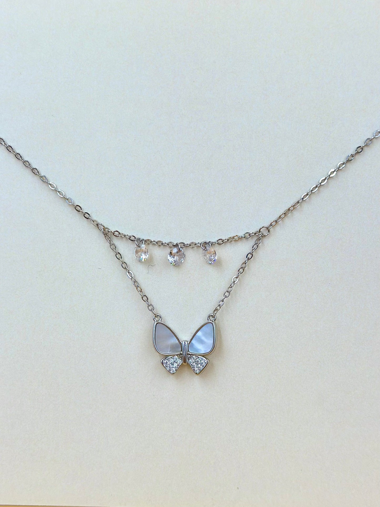Zircon studded, butterfly shaped sterling silver pendant chain
