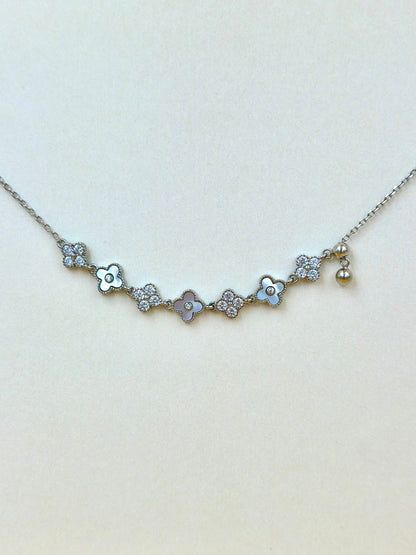 Zircon studded, flower shaped sterling silver pendant chain