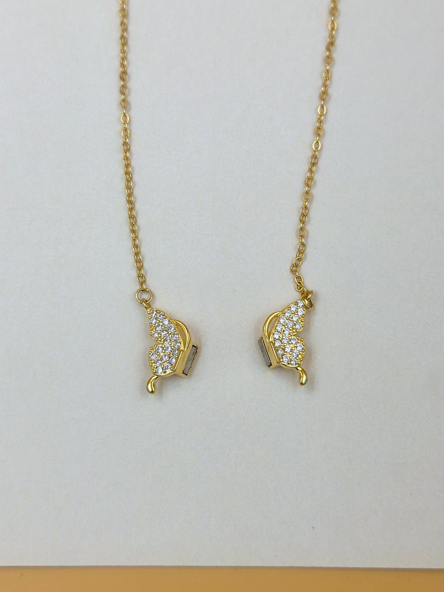 Zircon studded, butterfly shaped sterling silver pendant chain