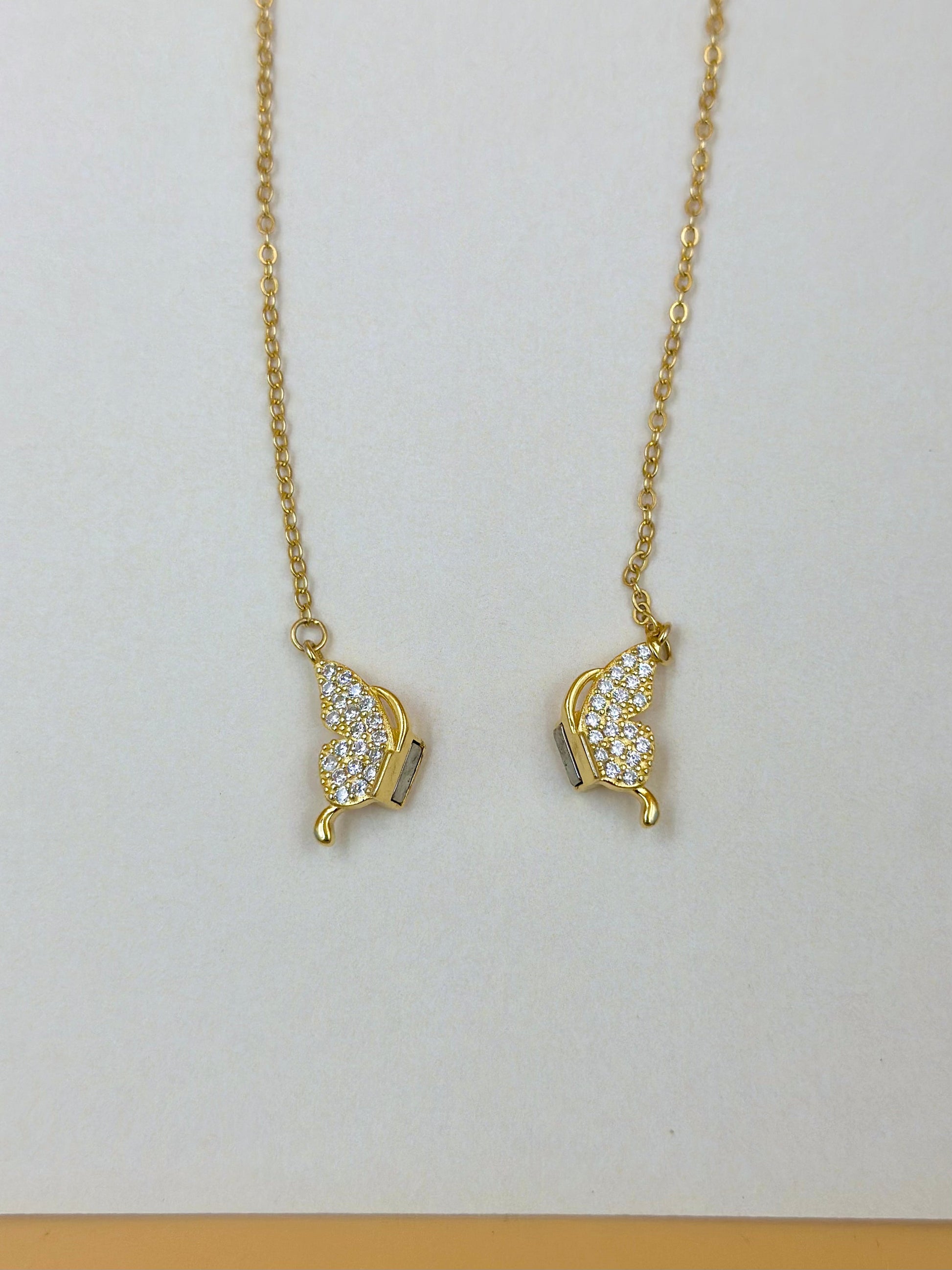 Zircon studded, butterfly shaped sterling silver pendant chain