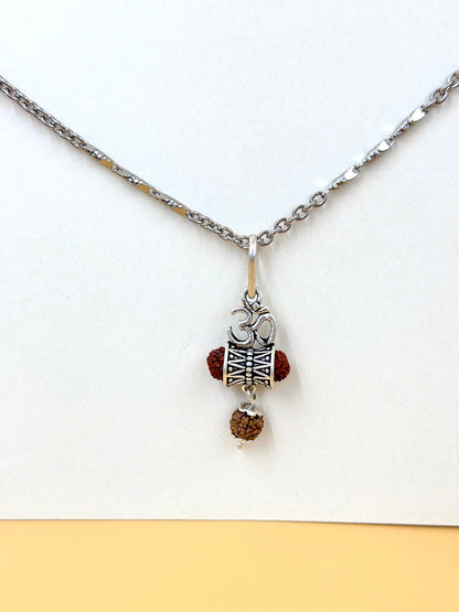 Oxidised, om shaped sterling silver idol pendant