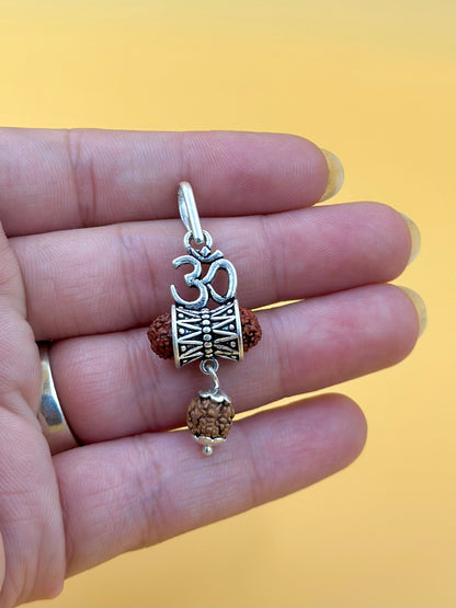 Oxidised, om shaped sterling silver idol pendant