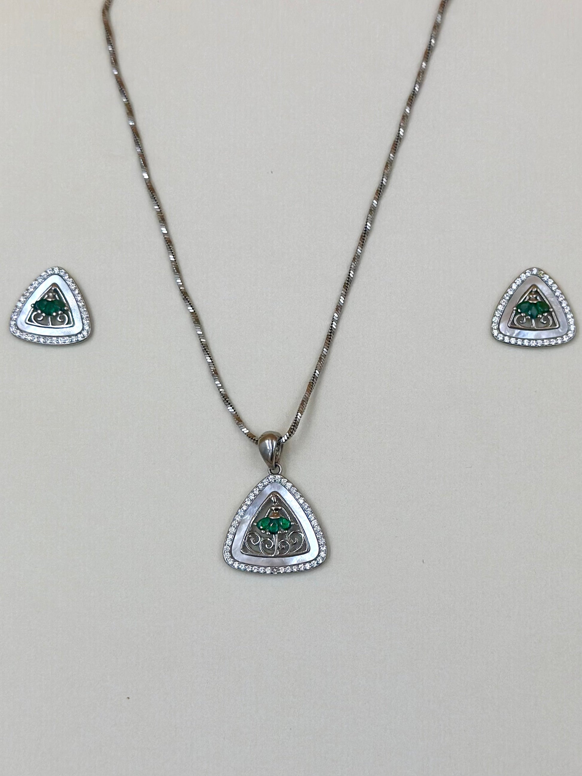 Triangle shaped, zircon studded sterling silver pendant set