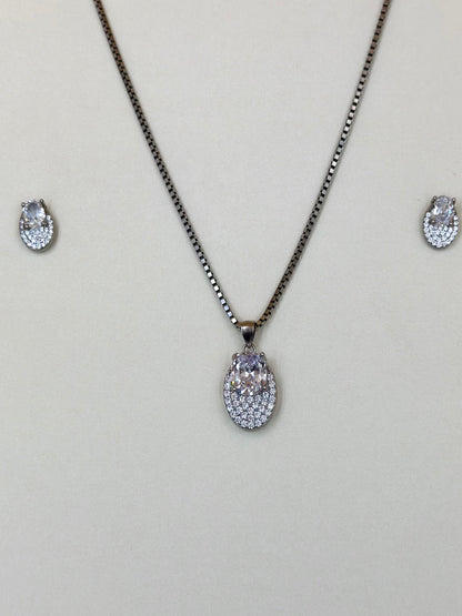 Oval shaped, zircon studded sterling silver pendant set