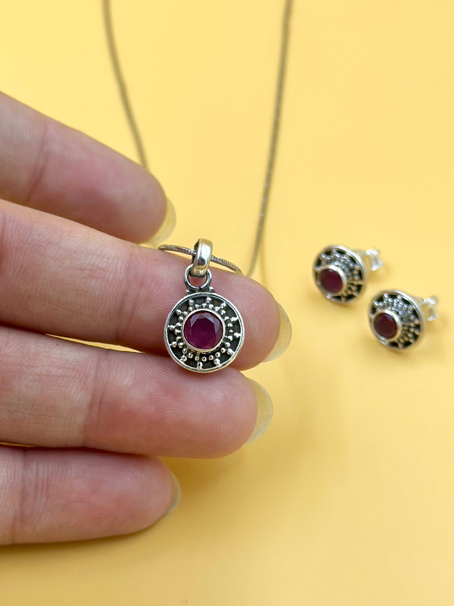 Ruby studded, oxidised sterling silver pendant set