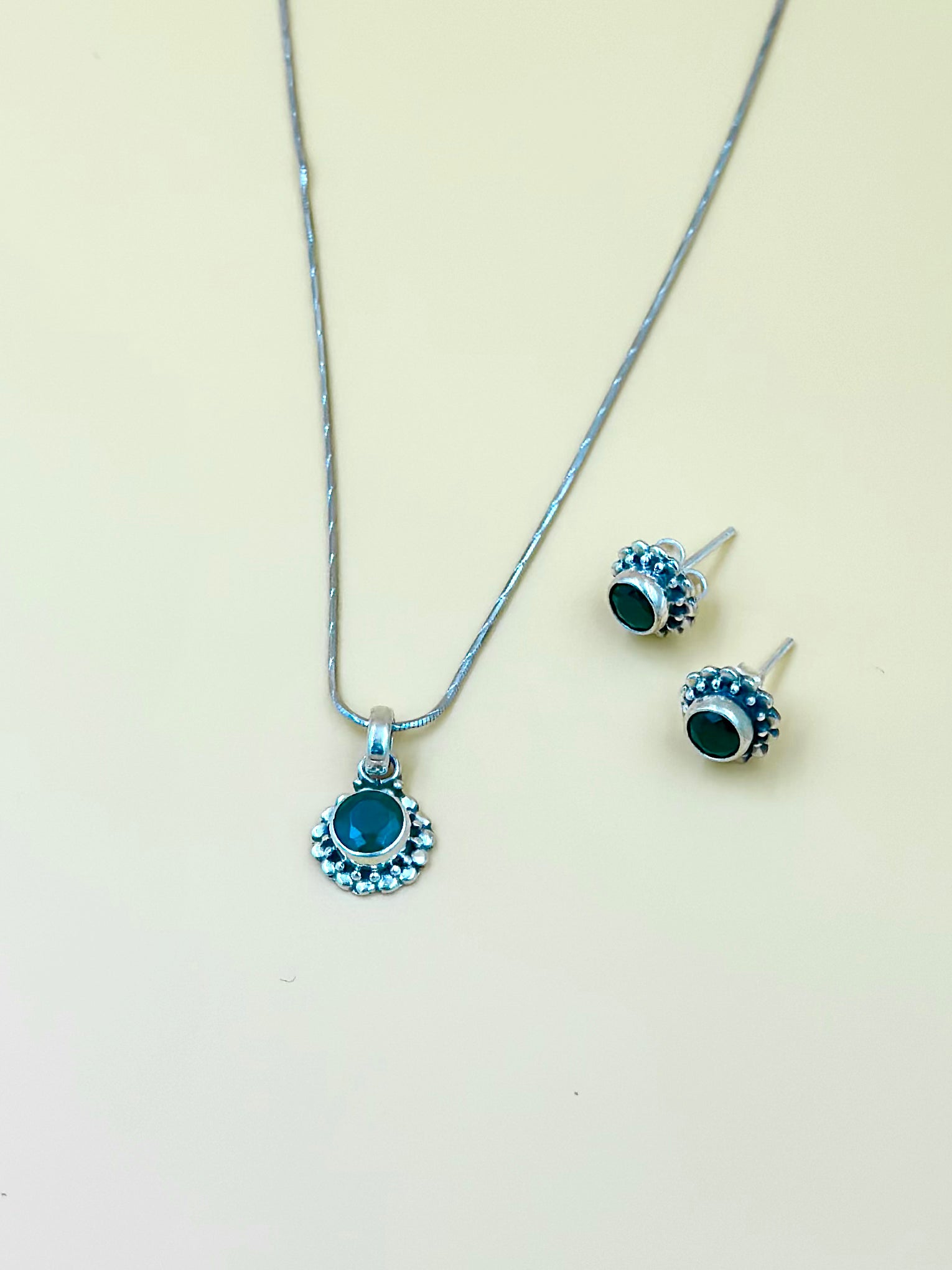 Stone studded, oxidised sterling silver pendant set