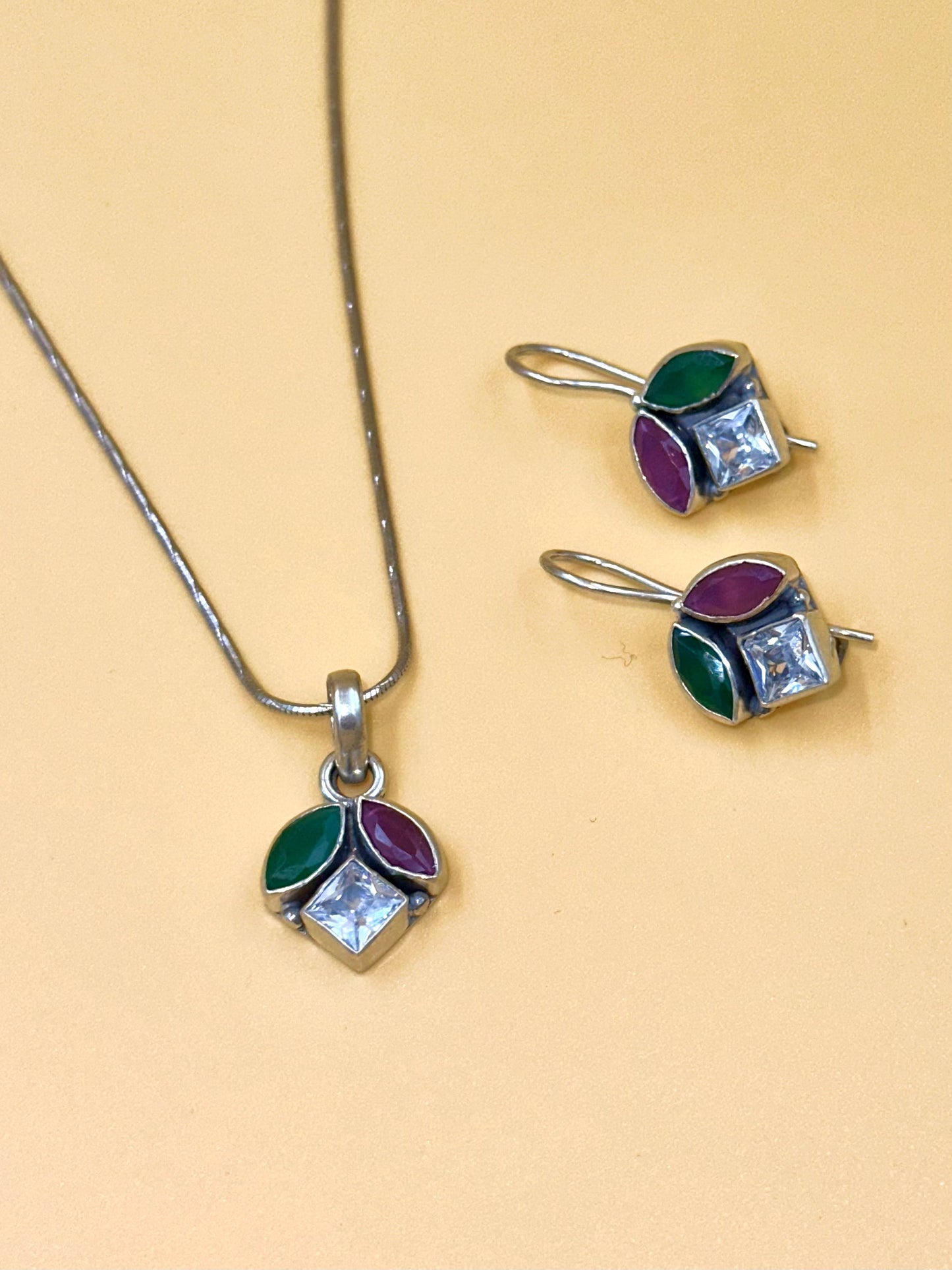 Zircon studded with fancy stones sterling silver pendant set