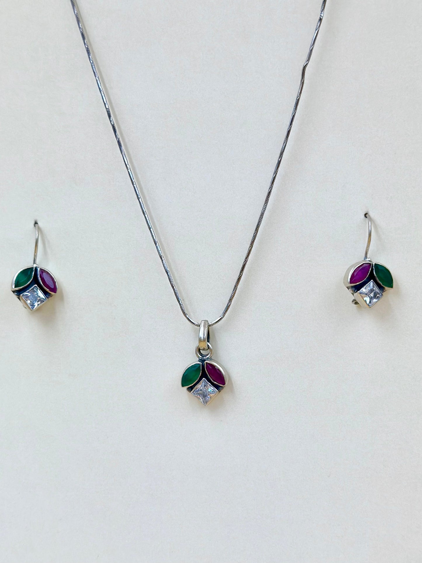 Zircon studded with fancy stones sterling silver pendant set